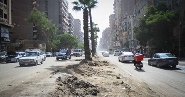 بالصور.. إهدار المال العام عرض مستمر بالجيزة.. عامان لتطوير شارع فيصل بتكلفة 30 مليون جنيه.. واستغاثات من عدم تمهيده.. التوسيع استفاد منه أصحاب المقاهى والمحلات.. وصفوف ثانية وثالثة لانتظار السيارات