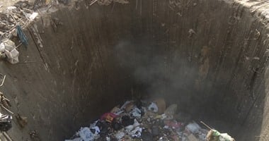بالصور.. حتى لا تتكرر مأساة طفل المعصرة.. بيارات الصرف الصحى بالجيزة تستعد لالتهام أجساد جديدة.. ولا مجيب.. إحداها بعمق 5 أمتار أمام مدرسة ببشتيل.. والأهالى يستغيثون برئيس الوزراء