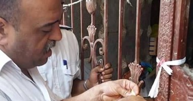 إخلاء عقار آيل للسقوط بمصر القديمة وتشميع محلات بجواره