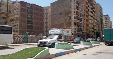 بالصور.. أهالى العجمى بالإسكندرية يساهمون فى تجميل وتطوير الحى