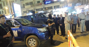 حملة لإزالة تعديات المقاهى والمحلات فى شارع فيصل والعمرانية 
