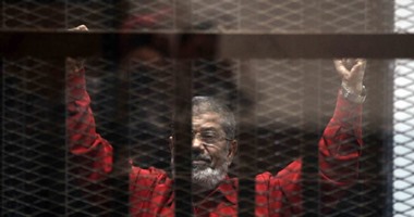 صور تجمع متهما بـ"التخابر مع قطر" مع مرسى.. وأفلام كرتون ضمن أحراز القضية
