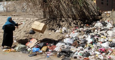 بالصور.. القمامة تحتل شوارع الوراق وإمبابة فى نهار رمضان