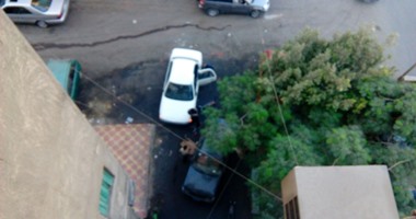 أهالى صقر قريش بالمعادى يعانون من انتشار القمامة وورش السيارات
