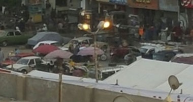 صحافة المواطن: بالصور.. أعمدة الإنارة مضاءة نهارًا بميدان العارف فى سوهاج