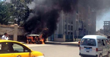احتراق سيارة أمام النادى الإسماعيلى بسبب ماس كهربائى