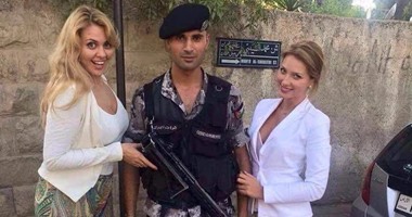 السجن شهرين لشرطى أردنى ترك عمله ليلتقط صور مع موظفات السفارة الروسية