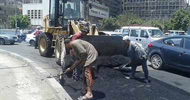 حى جنوب الجيزة: وضع طبقة أسفلت على الأماكن غير الممهدة بالشوارع لتسويتها