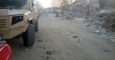 بالصور.. كردون أمنى بعد مقتل شاب بقرية بنى بخيت ببنى سويف