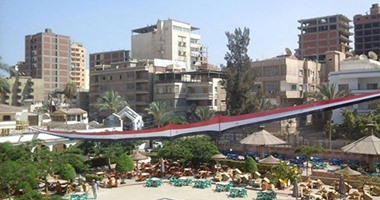 بالصور.. علم 60 متر يزين نادى بلدية المحلة احتفالا بقناة السويس