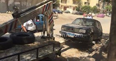 رفع 13 سيارة ودراجة بخارية متروكة فى حملات مرورية بشوارع الجيزة