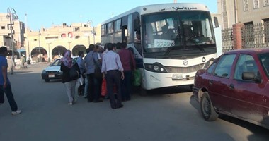 مرشحون ينقلون الناخبين بأتوبيسات المدارس الخاصة فى الوراق