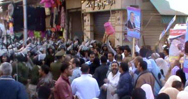 مشادات بين مؤيدى الحزب الوطنى والإخوان فى عابدين