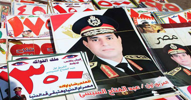 بالصور.. الفواكه ترفع لافتات مؤيدة للسيسى بالأسواق 