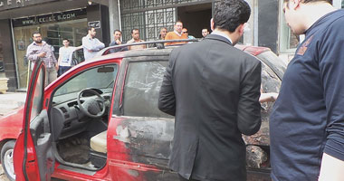 بالصور..النيابة تعاين سيارة عضو مجلس إدارة نادى قضاة المحلة المحترقة