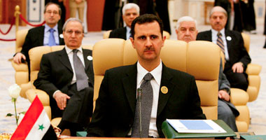 لقاء بين أولمرت والأسد بباريس