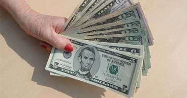 سعر الدولار يتراجع إلى أقل من 100 ين يابانى