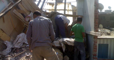 بالصور.. أنبوبة بوتاجاز تحول شقة لحطام بالجيزة