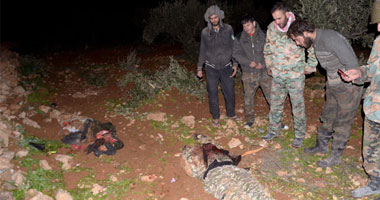 العثور على عشرات الجثث فى حى برزة فى دمشق وبها آثار تعذيب