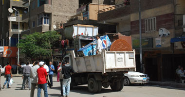 حملة أمنية لمطاردة البائعة الجائلين بميدان الجيزة