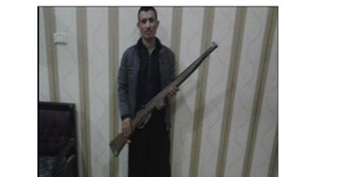 ضبط فلاح بحوزته بندقية غير مرخصة بالبدرشين