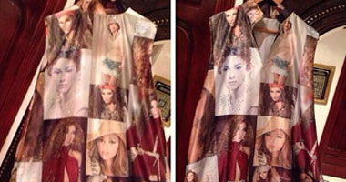 أحد معجبى ميريام فارس يهديها فستانا يجمع عددا كبيرا من صورها