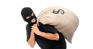 لص على كرسى متحرك يسرق بنكا فى نيويورك ويلوذ بالفرار