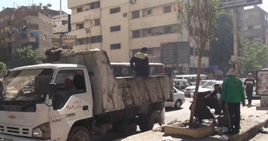 بالصور.. حملات نظافة بشوارع الجيزة لرفع كفاءتها