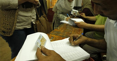 مشادات بين أنصار "مرسى وشفيق" بسبب التأثير على الناخبين فى بولاق