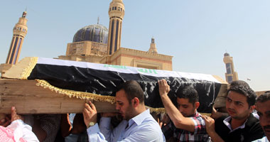 تشييع عراقى قتل أثناء "الدفاع" عن مقام السيدة زينب قرب دمشق