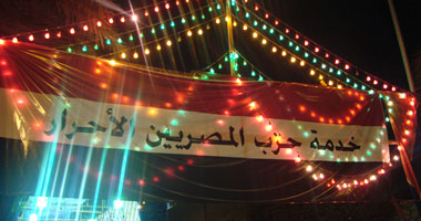 "ساويرس" يقوم بالدعاية لحزبه الجديد فى مولد السيدة نفيسة 
