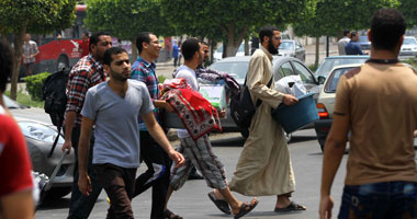  طلاب وطالبات الأزهر يغادرون المدينة الجامعية 